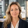 Tevreden opdrachtgever van NEXXT Facility in een kantooromgeving